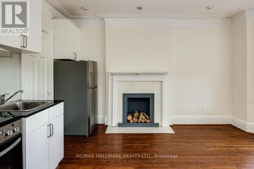 2A - 321 Palmerston Boulevard, Toronto, ON - Indoor With Fireplace