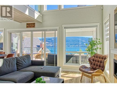 6845 Santiago Loop, Kelowna, BC - Indoor Photo Showing Living Room With Fireplace