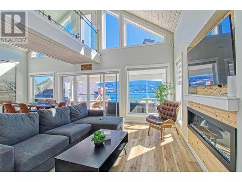 6845 Santiago Loop, Kelowna, BC - Indoor Photo Showing Living Room With Fireplace