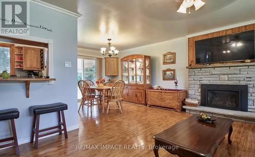 6 Kawartha Crescent, Kawartha Lakes, ON - Indoor Photo Showing Living Room With Fireplace