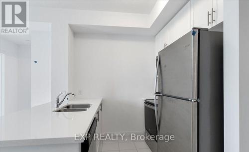 405 - 450 Dundas Street E, Hamilton (Waterdown), ON - Indoor Photo Showing Kitchen With Double Sink