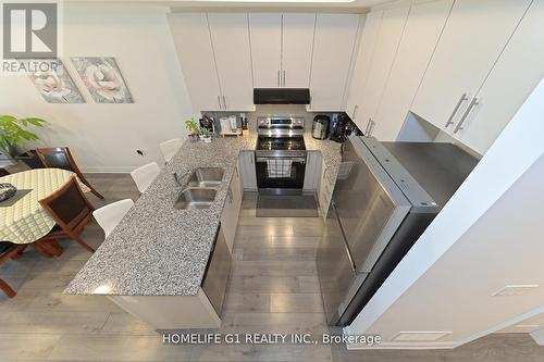 14 - 2607 Magdalen Path W, Oshawa, ON - Indoor Photo Showing Kitchen With Double Sink