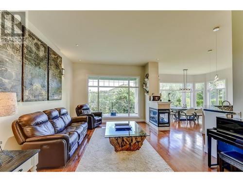 2168 Chilcotin Crescent, Kelowna, BC - Indoor Photo Showing Living Room With Fireplace