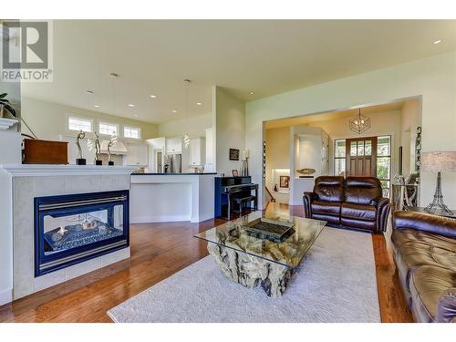 2168 Chilcotin Crescent, Kelowna, BC - Indoor Photo Showing Living Room With Fireplace