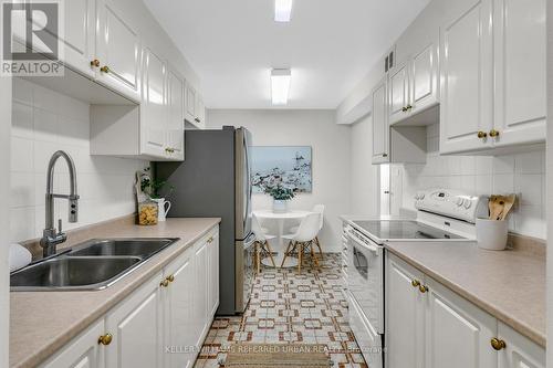 2012 - 61 Richview Road, Toronto (Humber Heights), ON - Indoor Photo Showing Kitchen With Double Sink