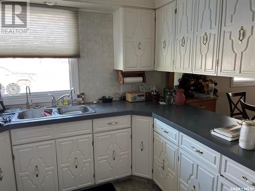 702 Portage Avenue, Wadena, SK - Indoor Photo Showing Kitchen With Double Sink