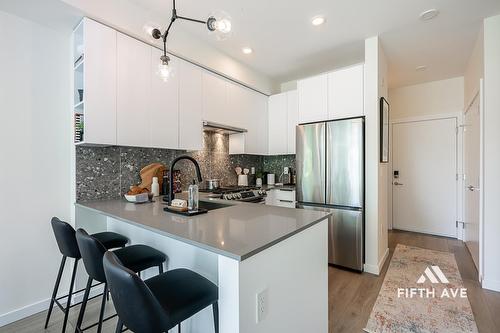 201 7936 206 Street, Langley, BC - Indoor Photo Showing Kitchen With Stainless Steel Kitchen With Upgraded Kitchen