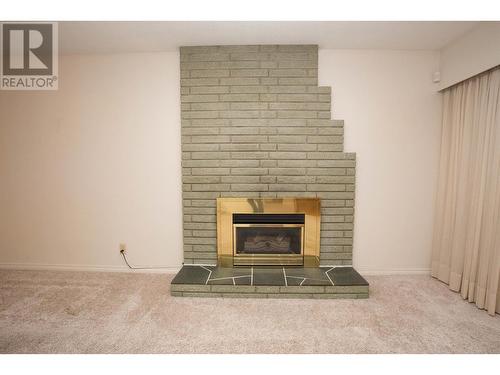 2660 1St Avenue, Prince George, BC - Indoor Photo Showing Living Room With Fireplace