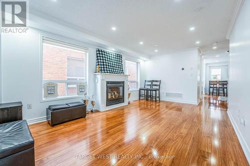 18 Spencer Drive, Brampton (Fletcher'S Meadow), ON - Indoor Photo Showing Living Room With Fireplace