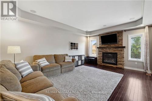 82 Creekside Drive, Welland, ON - Indoor Photo Showing Living Room With Fireplace