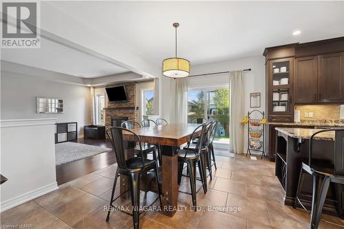 82 Creekside Drive, Welland, ON - Indoor Photo Showing Dining Room With Fireplace