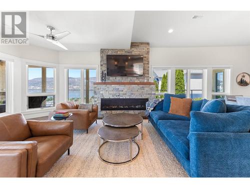 647 Royal Pine Drive, Kelowna, BC - Indoor Photo Showing Living Room With Fireplace