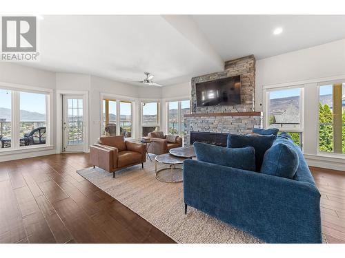 647 Royal Pine Drive, Kelowna, BC - Indoor Photo Showing Living Room With Fireplace