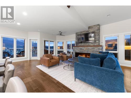 647 Royal Pine Drive, Kelowna, BC - Indoor Photo Showing Living Room With Fireplace