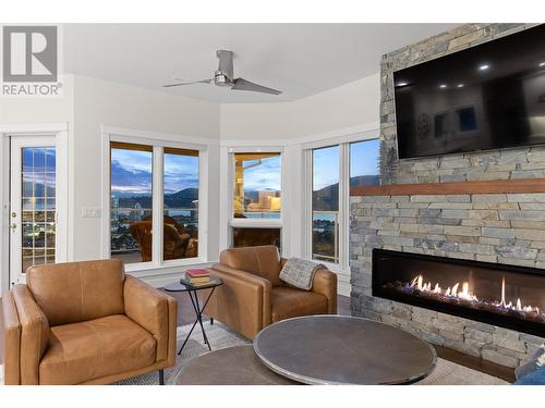 647 Royal Pine Drive, Kelowna, BC - Indoor Photo Showing Living Room With Fireplace