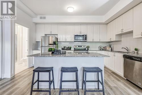 B602 - 5279 Highway  7 Road, Vaughan (Vaughan Grove), ON - Indoor Photo Showing Kitchen With Stainless Steel Kitchen With Upgraded Kitchen