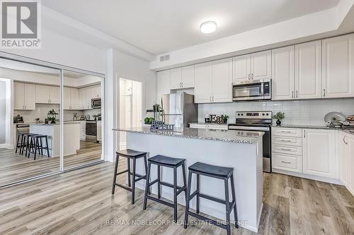 B602 - 5279 Highway  7 Road, Vaughan (Vaughan Grove), ON - Indoor Photo Showing Kitchen With Stainless Steel Kitchen With Upgraded Kitchen