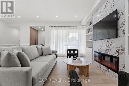 8 Shipley Road, Toronto, ON - Indoor Photo Showing Living Room With Fireplace