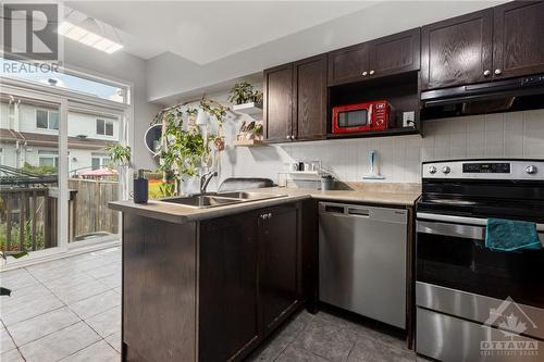 kitchen - 120 Lokoya Street, Stittsville, ON - Indoor Photo Showing Kitchen With Double Sink