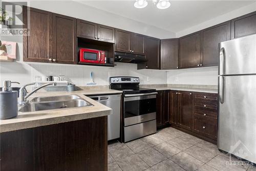 120 Lokoya Street, Stittsville, ON - Indoor Photo Showing Kitchen With Double Sink