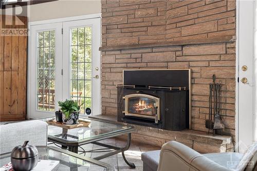 1205 Ventnor Road, Ottawa, ON - Indoor Photo Showing Living Room With Fireplace