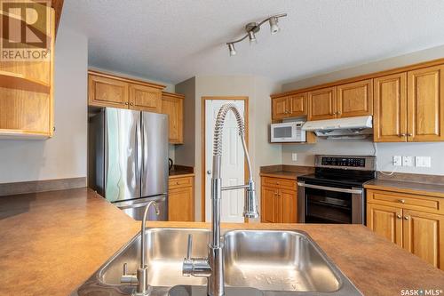 1130 Degelman Drive, Regina, SK - Indoor Photo Showing Kitchen With Double Sink