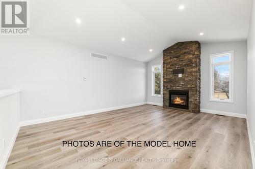 9 Clayton John Avenue, Brighton, ON - Indoor Photo Showing Living Room With Fireplace