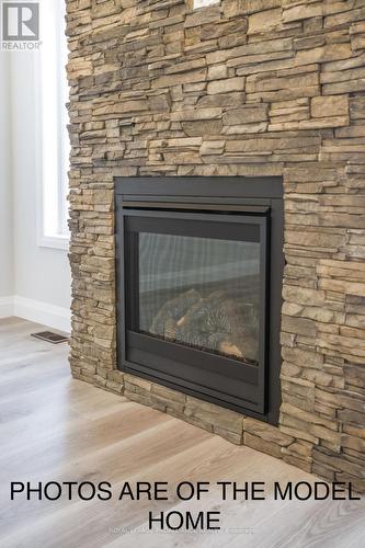 9 Clayton John Avenue, Brighton, ON - Indoor With Fireplace