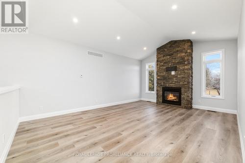 9 Clayton John Avenue, Brighton, ON - Indoor Photo Showing Living Room With Fireplace