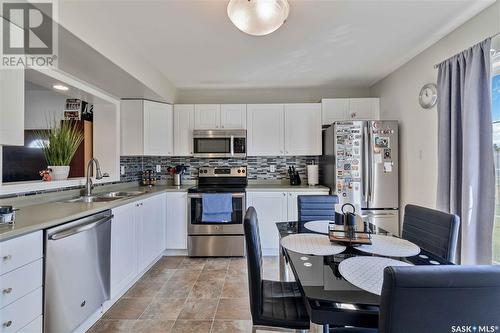 164 670 Kenderdine Road, Saskatoon, SK - Indoor Photo Showing Kitchen With Stainless Steel Kitchen With Double Sink