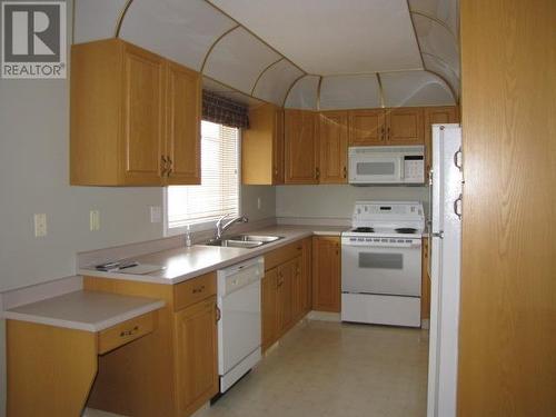 20 500 Wotzke Drive, Williams Lake, BC - Indoor Photo Showing Kitchen With Double Sink