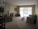 20 500 Wotzke Drive, Williams Lake, BC  - Indoor Photo Showing Living Room With Fireplace 