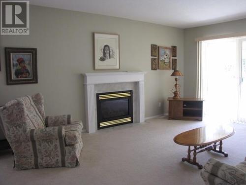 20 500 Wotzke Drive, Williams Lake, BC - Indoor Photo Showing Living Room With Fireplace