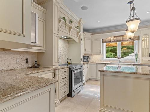 Cuisine - 17065 Rue Du Grenat, Mirabel, QC - Indoor Photo Showing Kitchen With Upgraded Kitchen