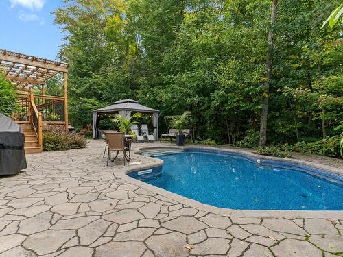 Piscine - 17065 Rue Du Grenat, Mirabel, QC - Outdoor With In Ground Pool With Backyard