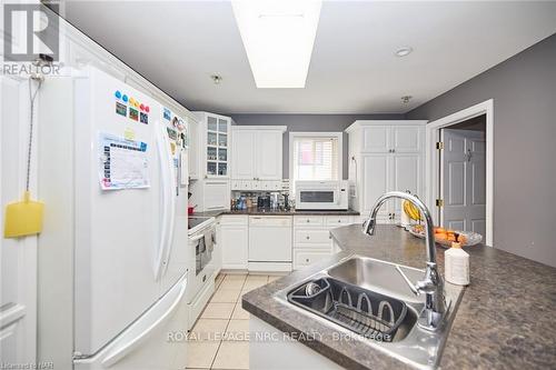 8040 Post Road, Niagara Falls, ON - Indoor Photo Showing Kitchen With Double Sink