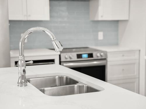 2319 Hudson Terr, Sooke, BC - Indoor Photo Showing Kitchen With Double Sink With Upgraded Kitchen