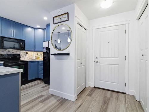 205-2881 Peatt Rd, Langford, BC - Indoor Photo Showing Kitchen