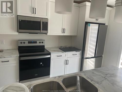 103 Kingsbridge Drive, Amherstburg, ON - Indoor Photo Showing Kitchen With Double Sink