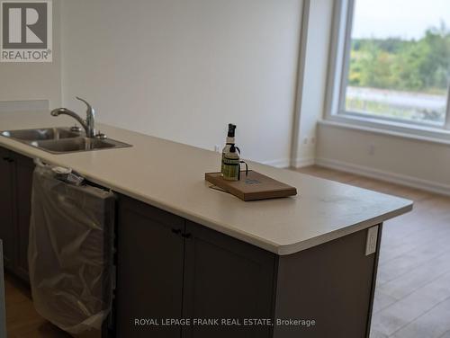 1001 - 160 Densmore Road, Cobourg, ON - Indoor Photo Showing Kitchen With Double Sink