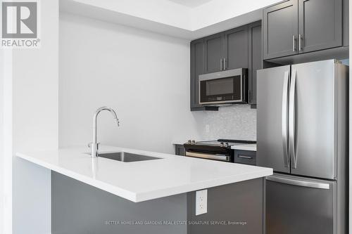 1013 - 470 Dundas Street E, Hamilton (Waterdown), ON - Indoor Photo Showing Kitchen With Stainless Steel Kitchen With Upgraded Kitchen