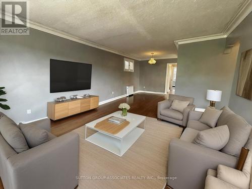 3 - 131 Kenwood Avenue, Toronto, ON - Indoor Photo Showing Living Room