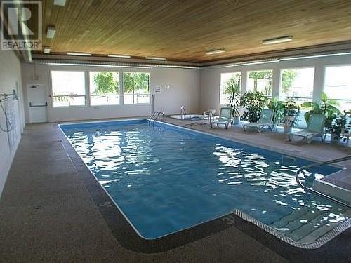 211 2Nd Street, Vernon, BC - Indoor Photo Showing Other Room With In Ground Pool