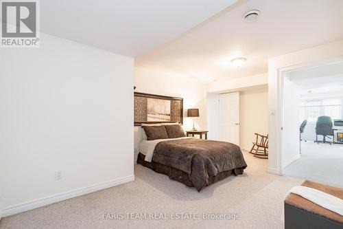 1331 Flos Road 3 E, Springwater, ON - Indoor Photo Showing Bedroom