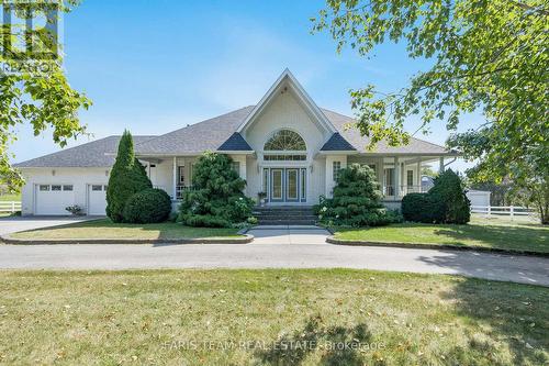 1331 Flos Road 3 E, Springwater, ON - Outdoor With Facade