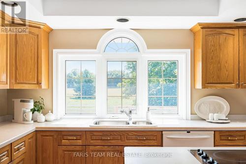 1331 Flos Road 3 E, Springwater, ON - Indoor Photo Showing Kitchen With Double Sink