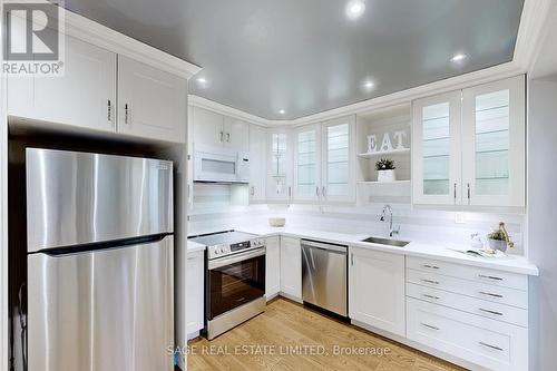 20 - 2275 Credit Valley Road, Mississauga, ON - Indoor Photo Showing Kitchen With Upgraded Kitchen