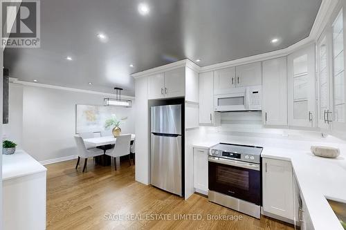 20 - 2275 Credit Valley Road, Mississauga, ON - Indoor Photo Showing Kitchen