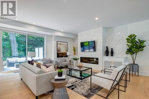 4 Tredvalley Drive, Toronto (Centennial Scarborough), ON - Indoor Photo Showing Living Room With Fireplace