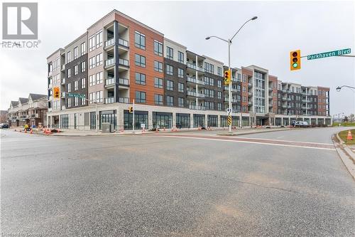 150 Oak Park Boulevard Unit# 320, Oakville, ON - Outdoor With Balcony With Facade